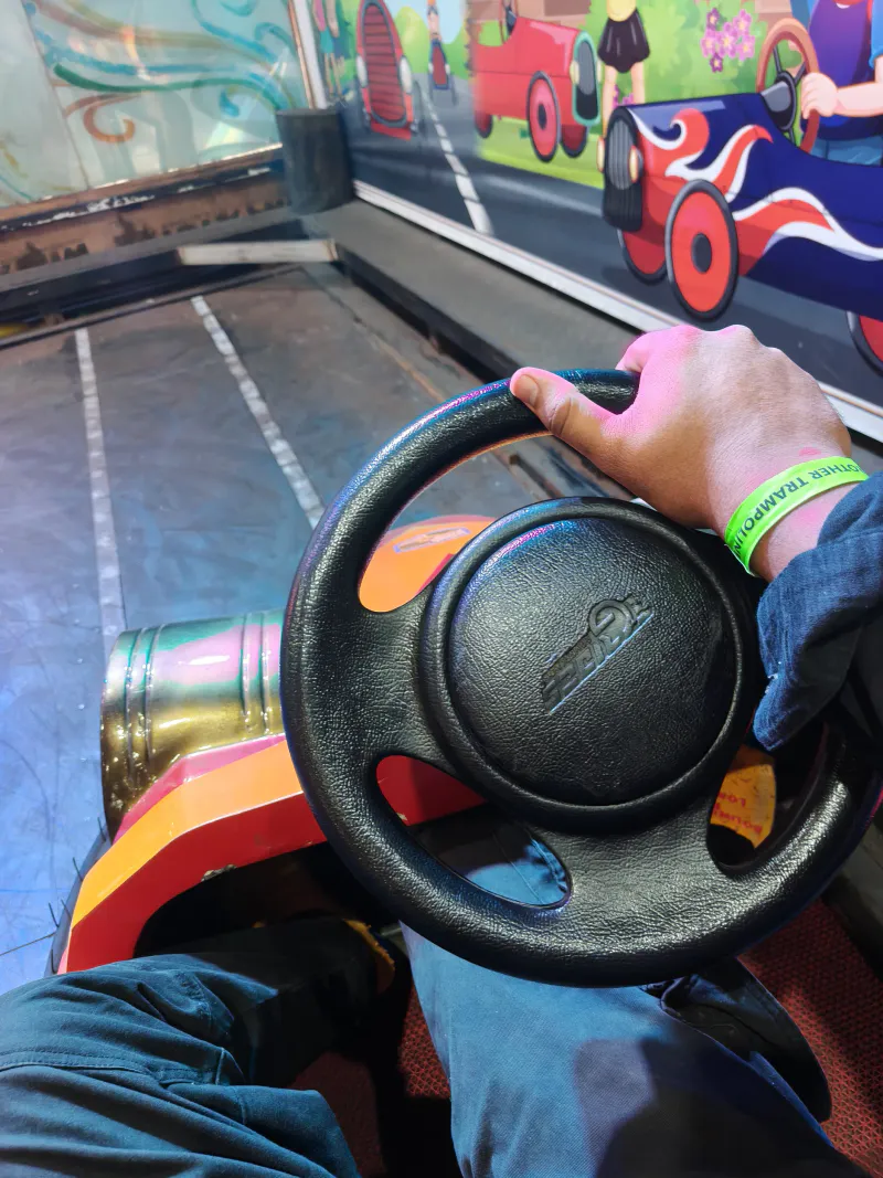 Steering towards joy on this colorful childhood ride.